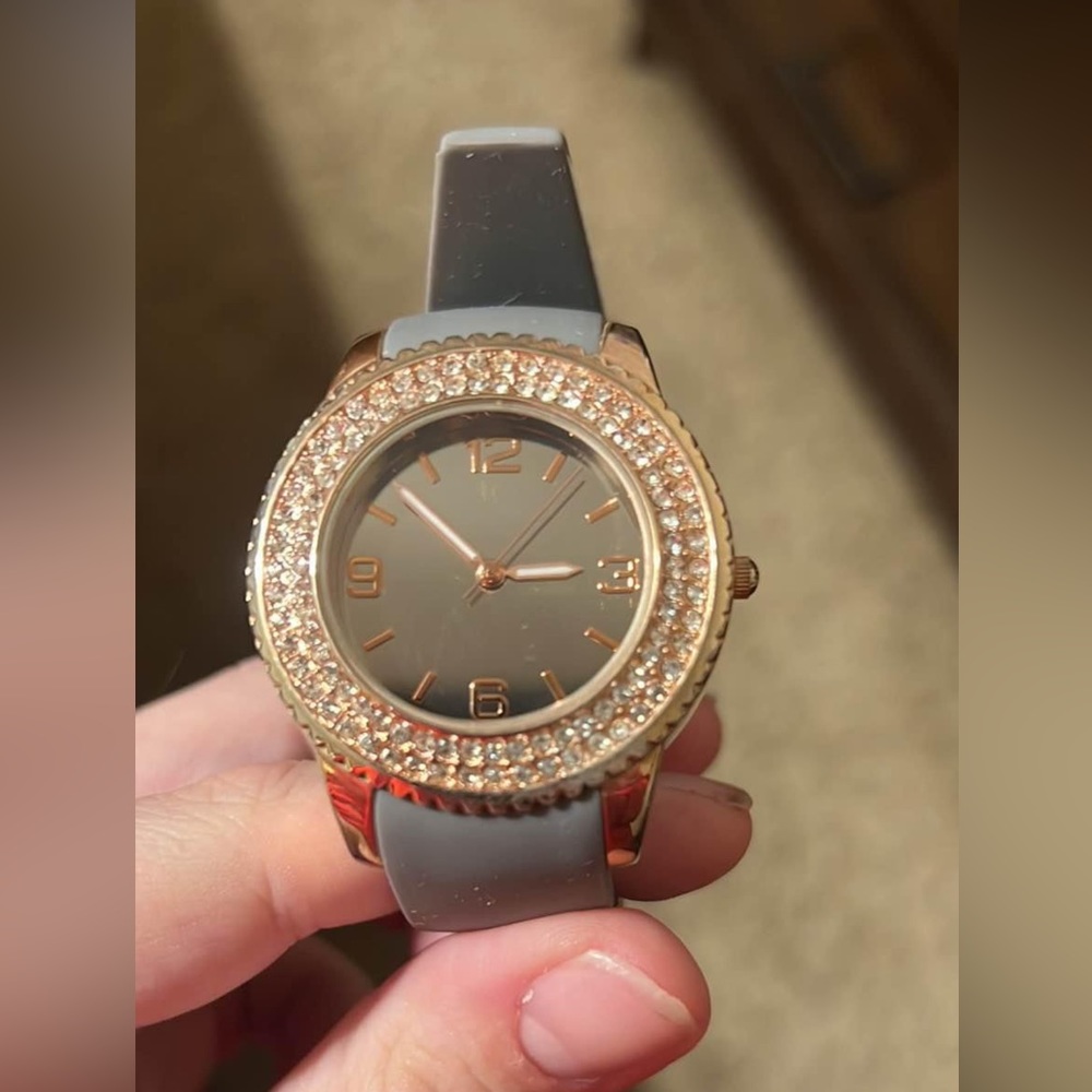 Grey woman’s watch.